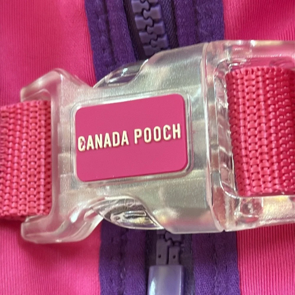 New High Tide life jacket by Canada Pooch for swimming. Pink and Purple. Size 18